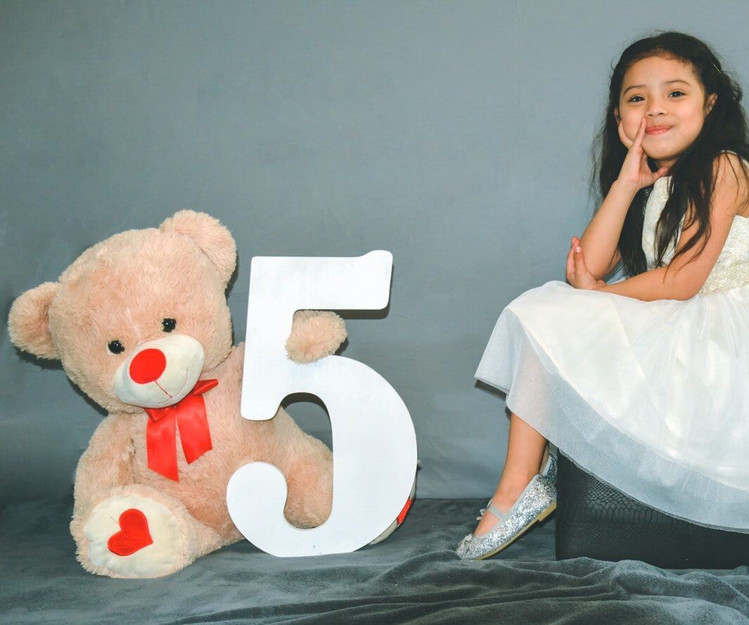 5 year old child with teddy bear