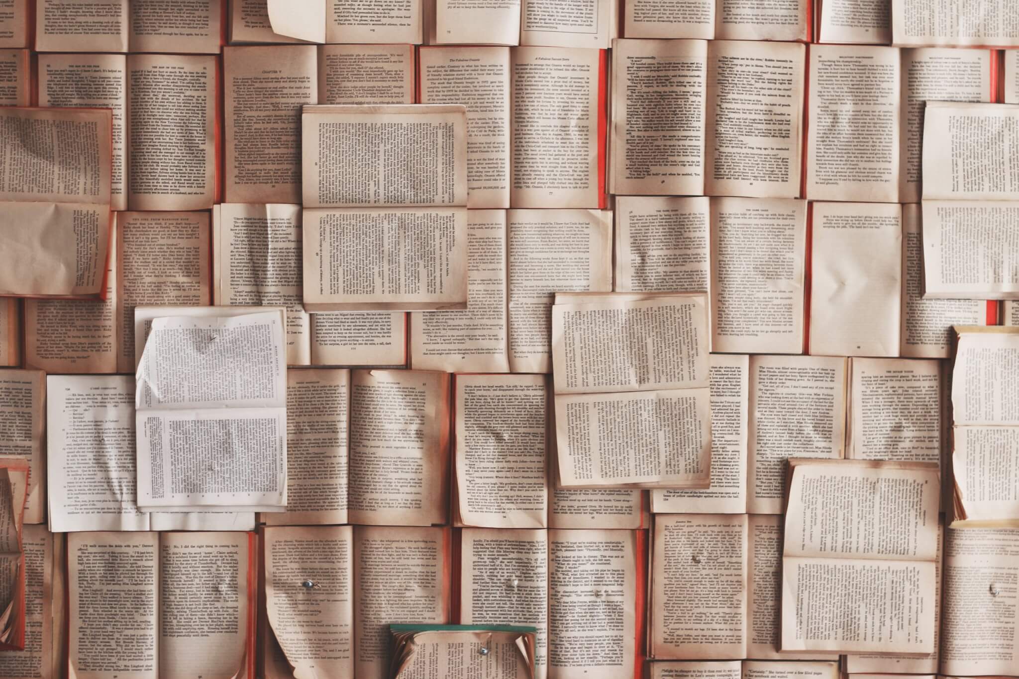 books pinned to a wall